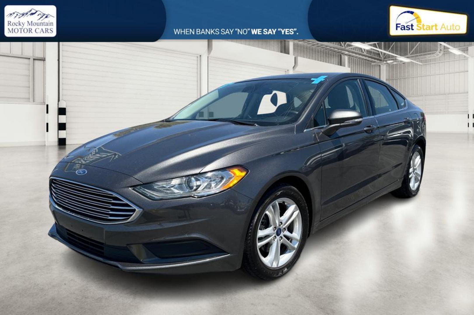 2018 Gray Ford Fusion SE (3FA6P0HD7JR) with an 1.5L L4 DOHC 16V engine, 6A transmission, located at 7755 State Street, Midvale, UT, 84047, (801) 753-9063, 40.610329, -111.892159 - Photo#6