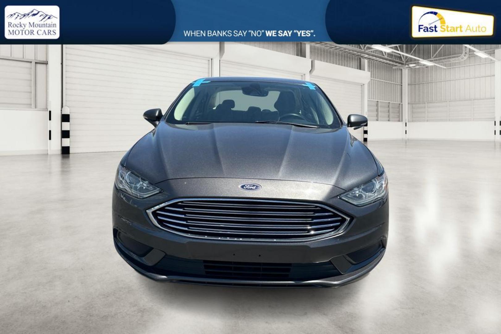 2018 Gray Ford Fusion SE (3FA6P0HD7JR) with an 1.5L L4 DOHC 16V engine, 6A transmission, located at 7755 State Street, Midvale, UT, 84047, (801) 753-9063, 40.610329, -111.892159 - Photo#7