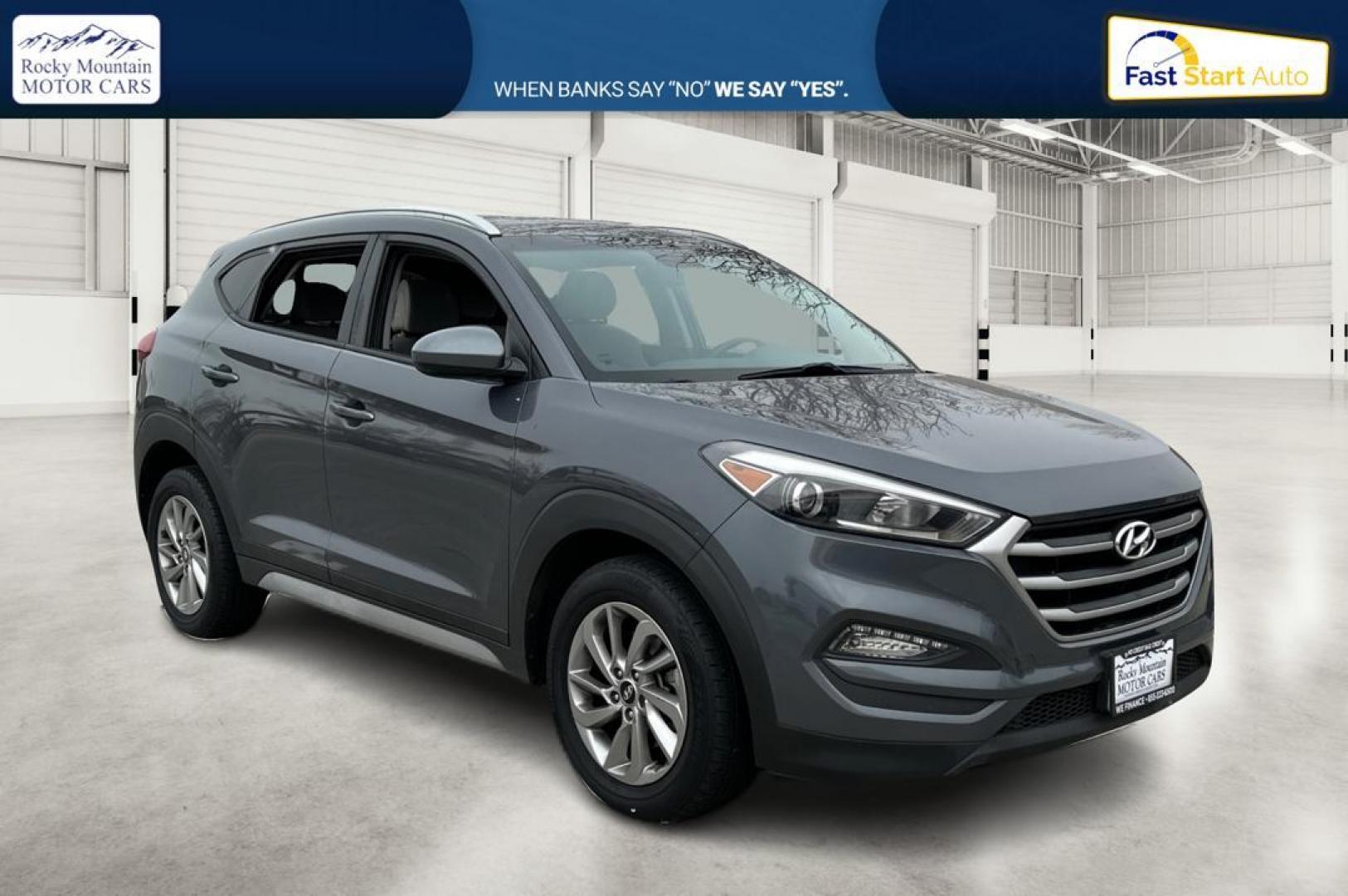 2018 Gray Hyundai Tucson SE (KM8J33A48JU) with an 2.0L L4 DOHC 16V engine, 6A transmission, located at 344 S Washington Blvd, Ogden, UT, 84404, (801) 399-1799, 41.255482, -111.970848 - Photo#0