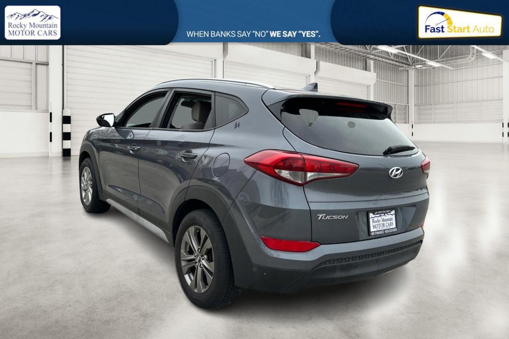 2018 Gray Hyundai Tucson SE (KM8J33A48JU) with an 2.0L L4 DOHC 16V engine, 6A transmission, located at 344 S Washington Blvd, Ogden, UT, 84404, (801) 399-1799, 41.255482, -111.970848 - Photo#5