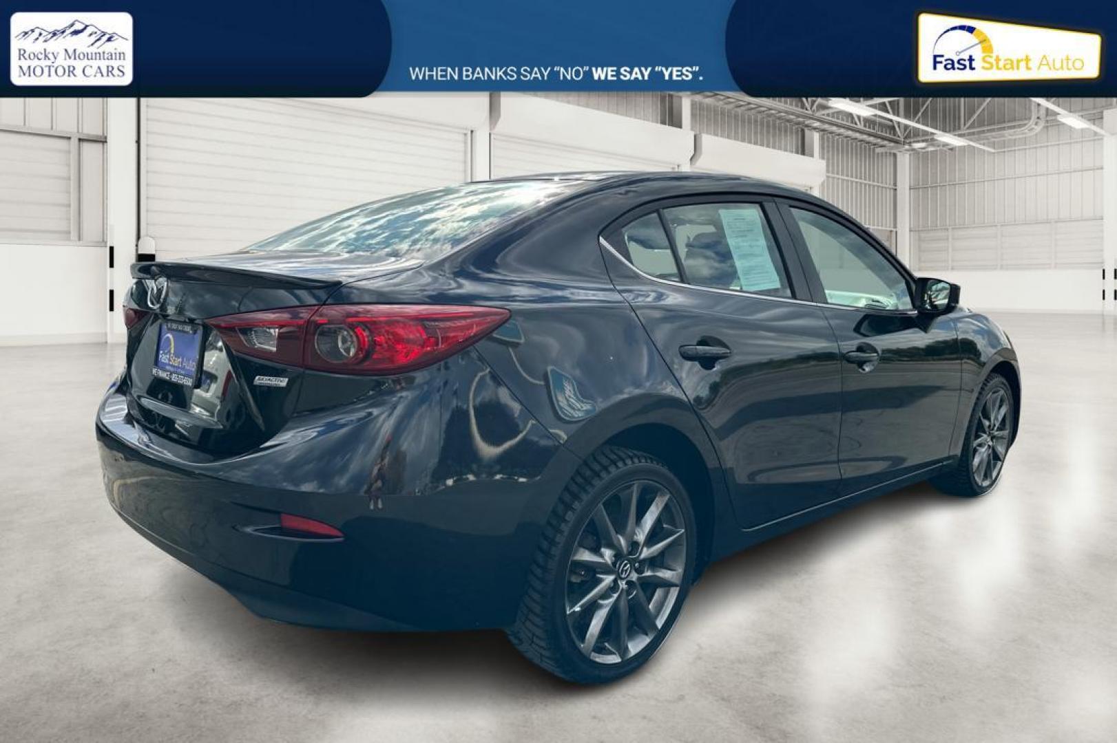 2018 Black Mazda MAZDA3 s Touring AT 4-Door (3MZBN1V30JM) with an 2.5L L4 DOHC 16V engine, 6A transmission, located at 7755 State Street, Midvale, UT, 84047, (801) 753-9063, 40.610329, -111.892159 - Photo#2