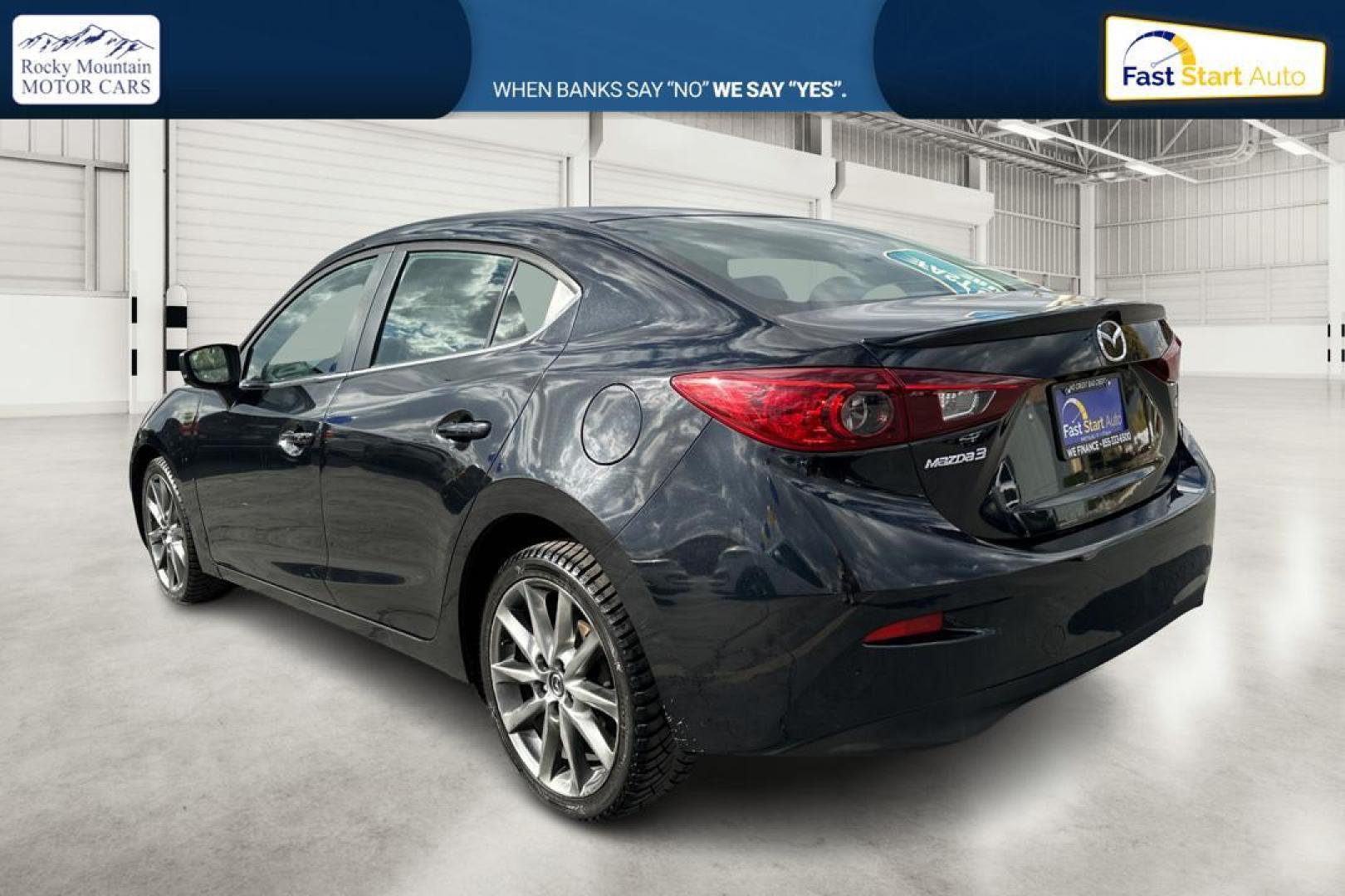 2018 Black Mazda MAZDA3 s Touring AT 4-Door (3MZBN1V30JM) with an 2.5L L4 DOHC 16V engine, 6A transmission, located at 7755 State Street, Midvale, UT, 84047, (801) 753-9063, 40.610329, -111.892159 - Photo#5