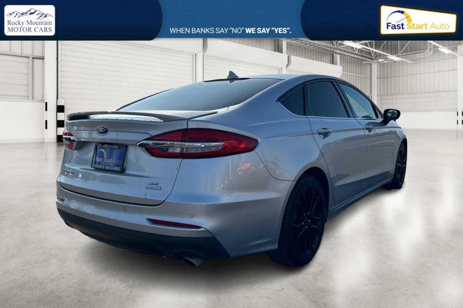 2019 Silver Ford Fusion SE (3FA6P0HD0KR) with an 1.5L L4 DOHC 16V engine, 6A transmission, located at 7755 State Street, Midvale, UT, 84047, (801) 753-9063, 40.610329, -111.892159 - Photo#2