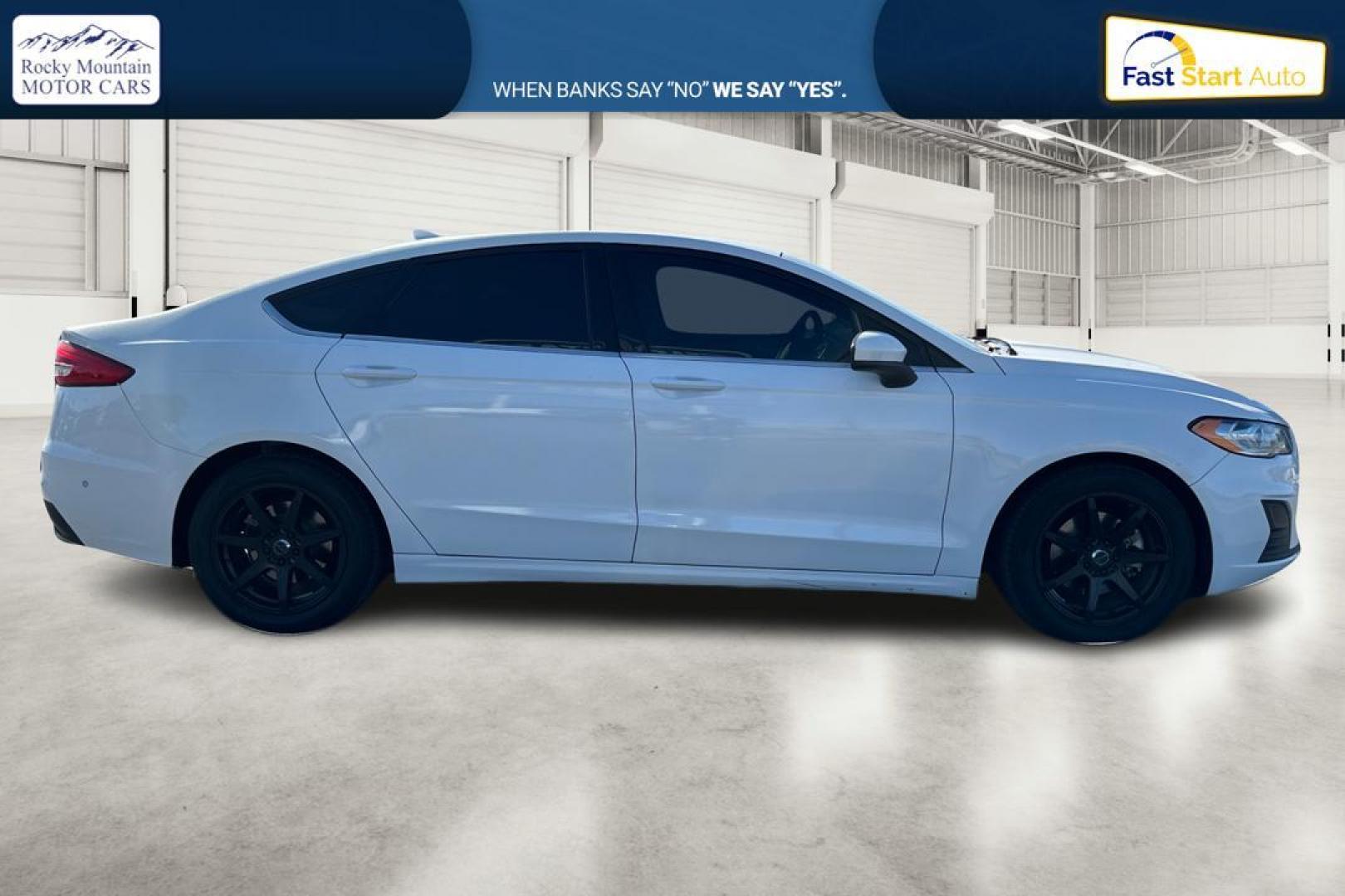 2019 White Ford Fusion SE (3FA6P0HD1KR) with an 1.5L L4 DOHC 16V engine, 6A transmission, located at 7755 State Street, Midvale, UT, 84047, (801) 753-9063, 40.610329, -111.892159 - Photo#1