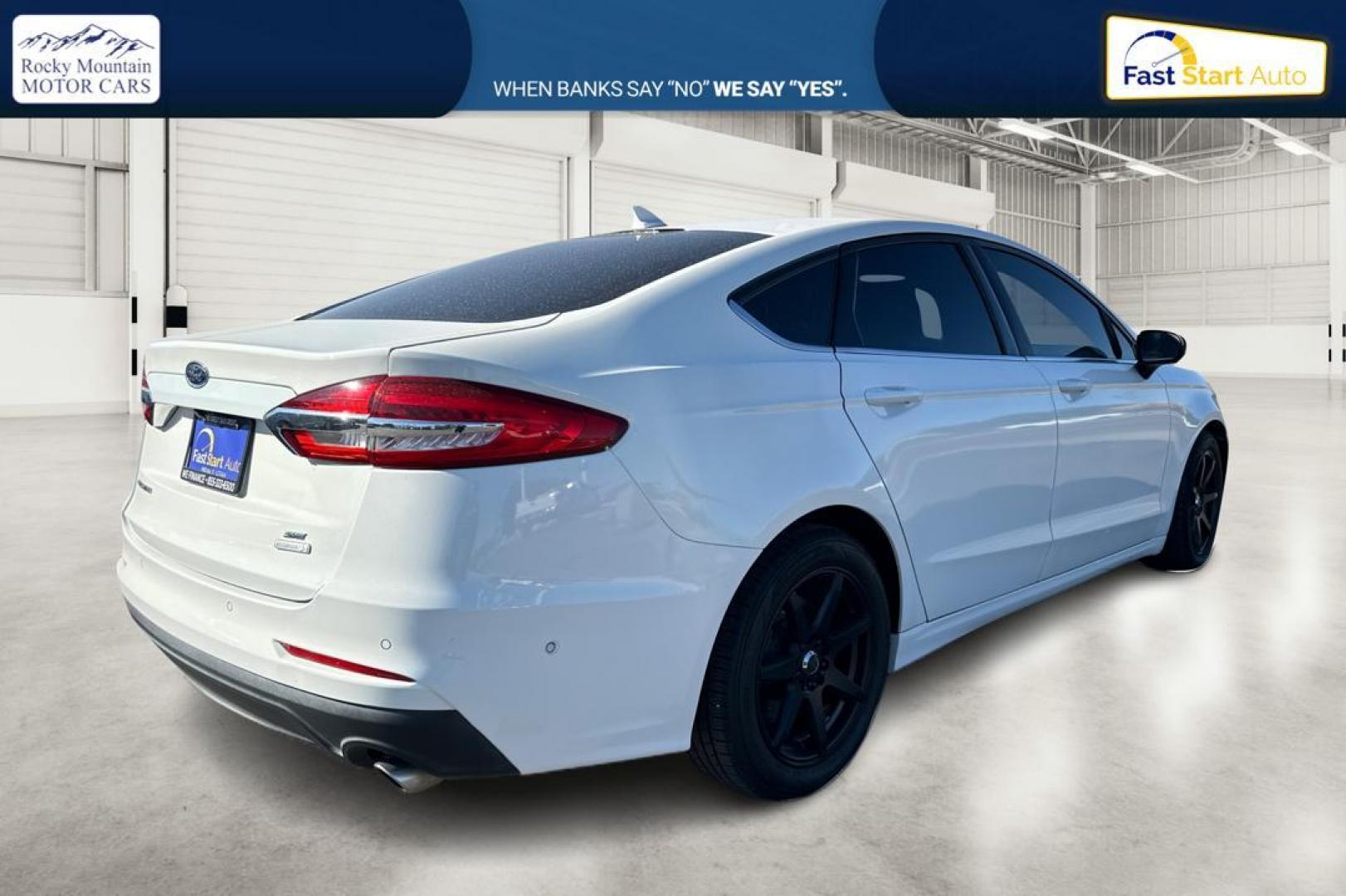 2019 White Ford Fusion SE (3FA6P0HD1KR) with an 1.5L L4 DOHC 16V engine, 6A transmission, located at 7755 State Street, Midvale, UT, 84047, (801) 753-9063, 40.610329, -111.892159 - Photo#2