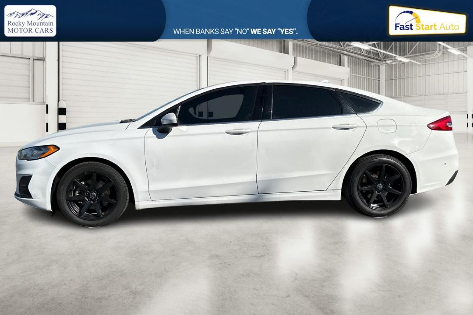 2019 White Ford Fusion SE (3FA6P0HD1KR) with an 1.5L L4 DOHC 16V engine, 6A transmission, located at 7755 State Street, Midvale, UT, 84047, (801) 753-9063, 40.610329, -111.892159 - Photo#6