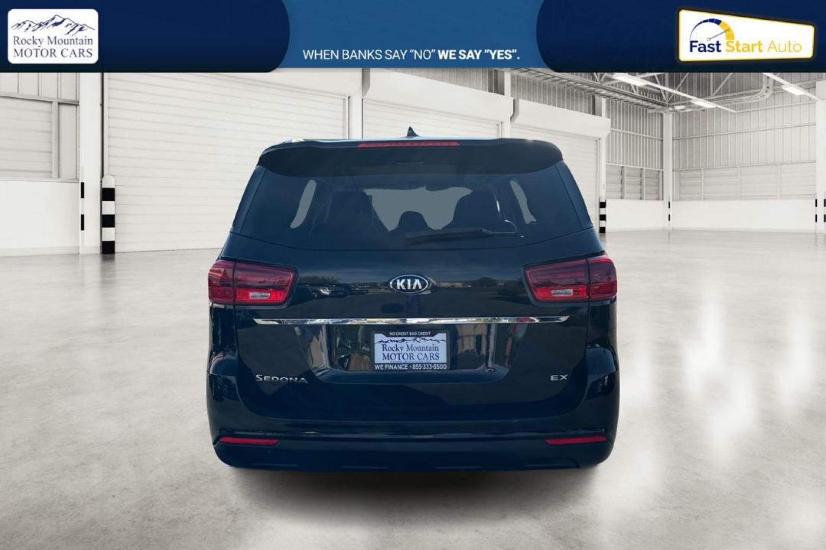 2019 Black Kia Sedona LX (KNDMB5C15K6) with an 3.3L V6 DOHC 24V engine, 6A transmission, located at 767 S State Road, Pleasant Grove, UT, 84062, (801) 785-1058, 40.354839, -111.736687 - Photo#4