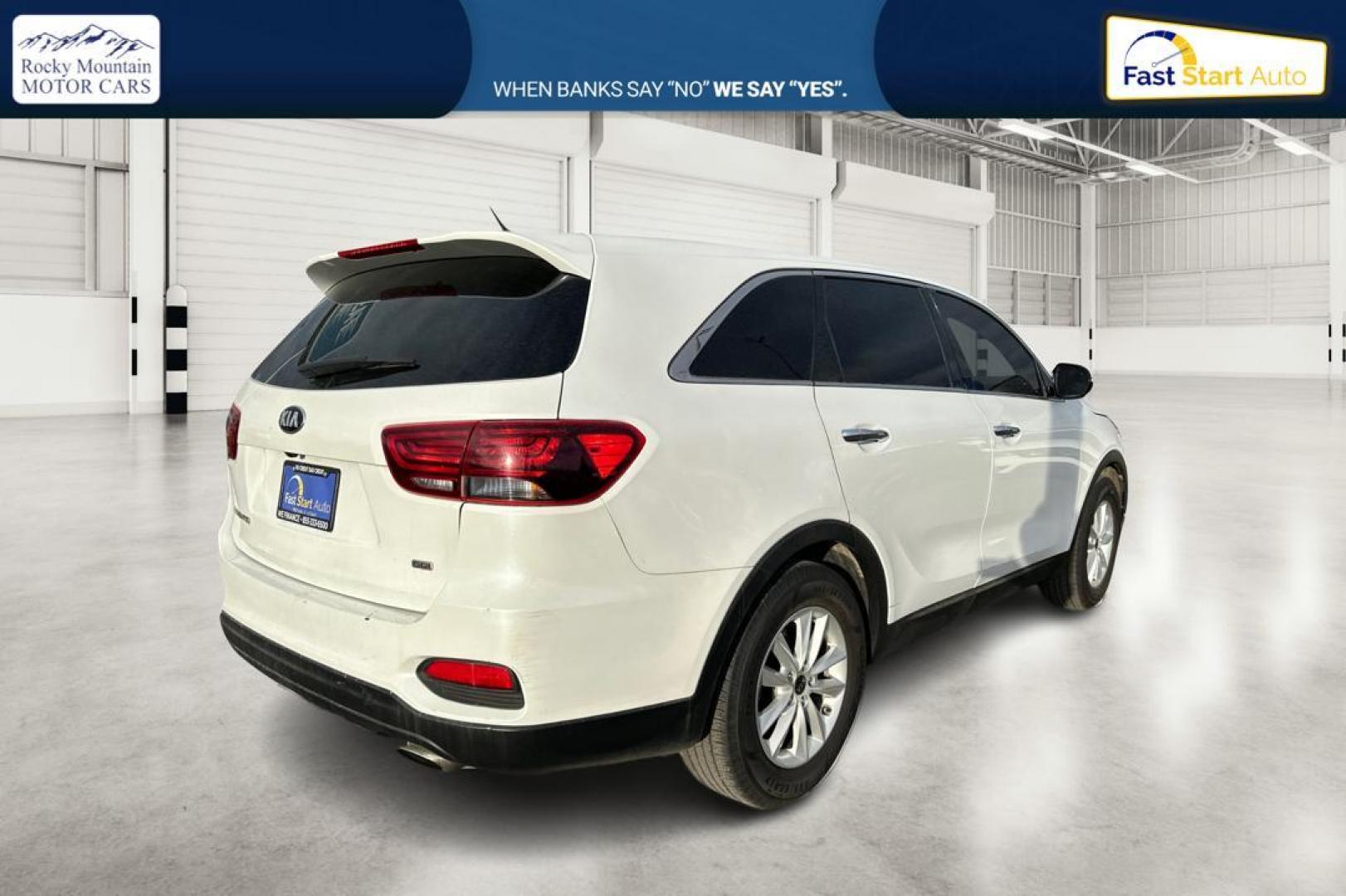 2019 White Kia Sorento LX 2WD (5XYPG4A31KG) with an 2.4L L4 DOHC 16V engine, 6A transmission, located at 7755 State Street, Midvale, UT, 84047, (801) 753-9063, 40.610329, -111.892159 - Photo#2