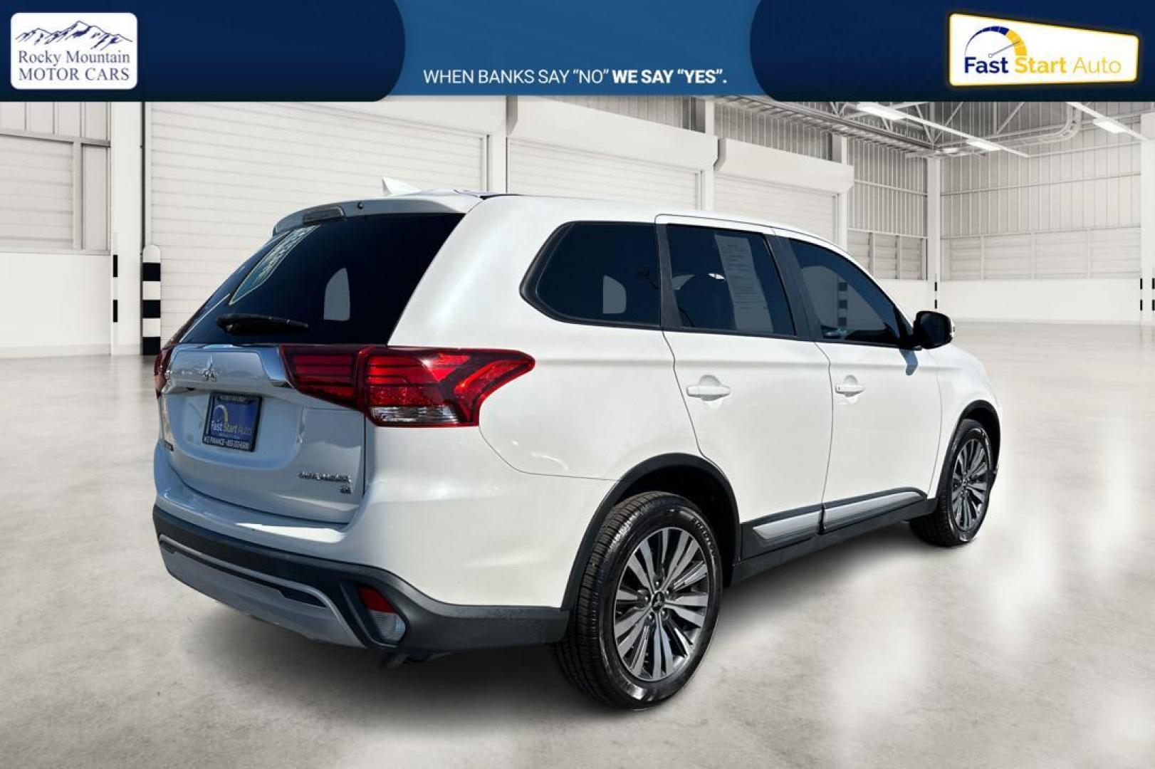 2019 White Mitsubishi Outlander SEL AWD (JA4AZ3A33KZ) with an 2.4L L4 DOHC 16V engine, CVT transmission, located at 7755 State Street, Midvale, UT, 84047, (801) 753-9063, 40.610329, -111.892159 - Photo#2