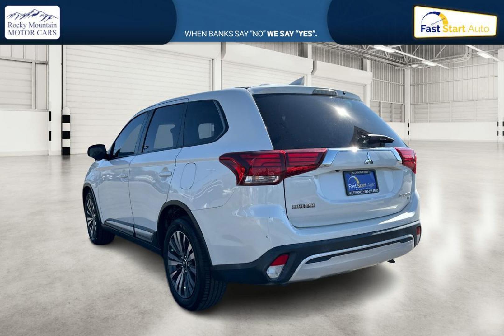 2019 White Mitsubishi Outlander SEL AWD (JA4AZ3A33KZ) with an 2.4L L4 DOHC 16V engine, CVT transmission, located at 7755 State Street, Midvale, UT, 84047, (801) 753-9063, 40.610329, -111.892159 - Photo#4