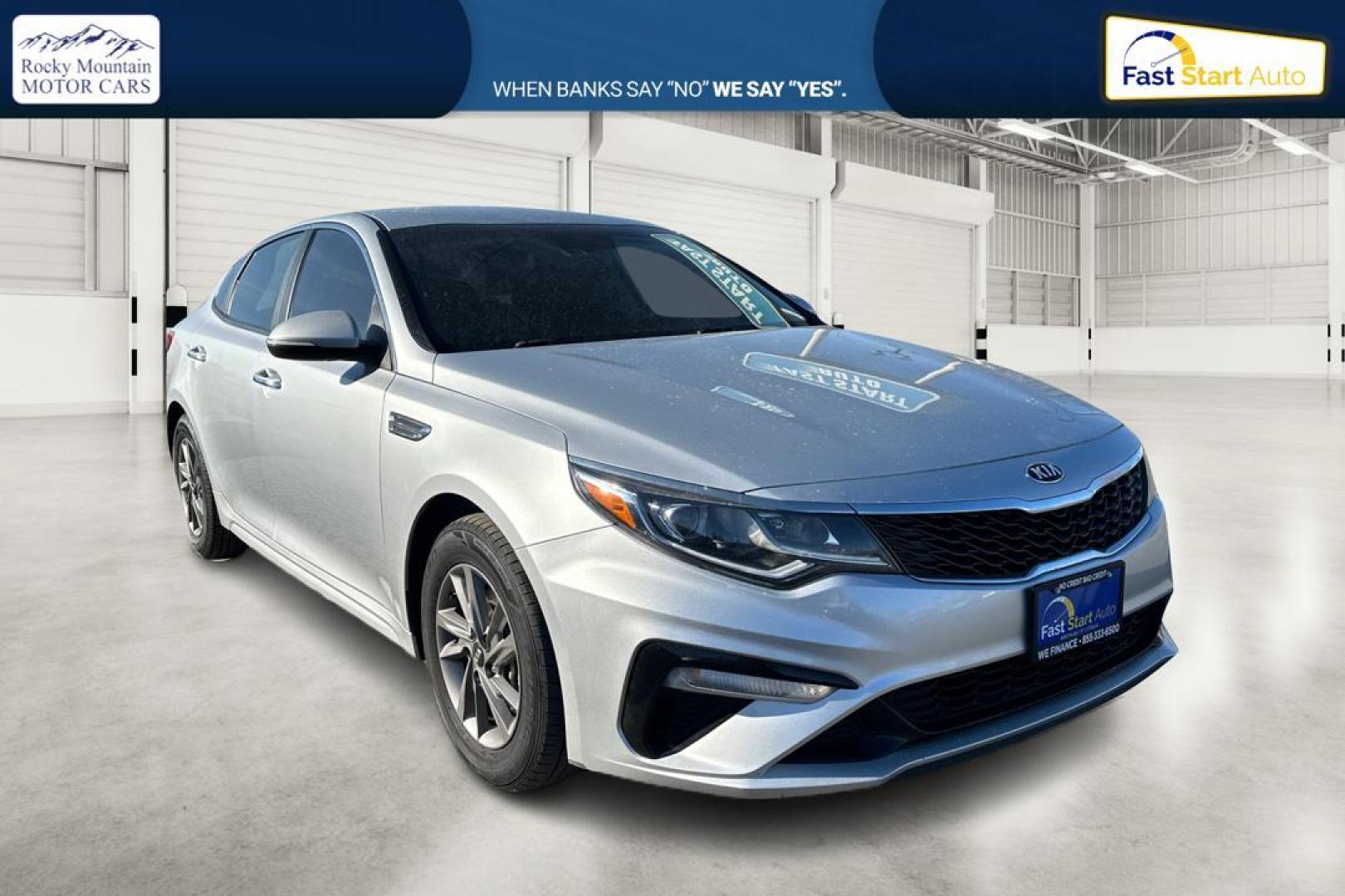 2020 Silver Kia Optima LX (5XXGT4L35LG) with an 2.4L L4 DOHC 16V engine, 6A transmission, located at 344 S Washington Blvd, Ogden, UT, 84404, (801) 399-1799, 41.255482, -111.970848 - Photo#0