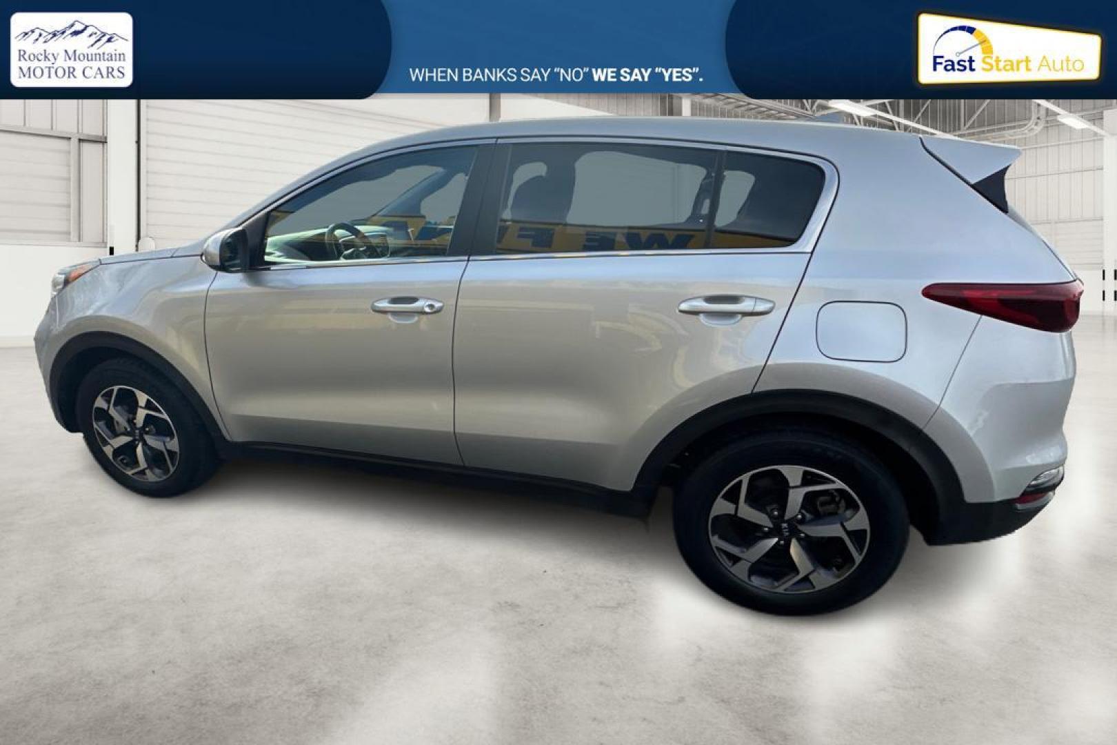 2021 Silver Kia Sportage LX FWD (KNDPM3ACXM7) with an 2.4L V6 DOHC 24V engine, 6A transmission, located at 344 S Washington Blvd, Ogden, UT, 84404, (801) 399-1799, 41.255482, -111.970848 - Photo#5